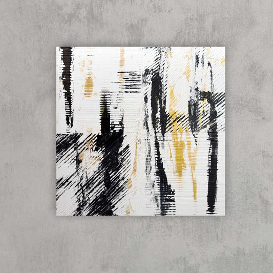 Canvas measures 20x20 inches and features an acrylic-based abstract painting. Color is white, black and gold. Shown on a grey wall.